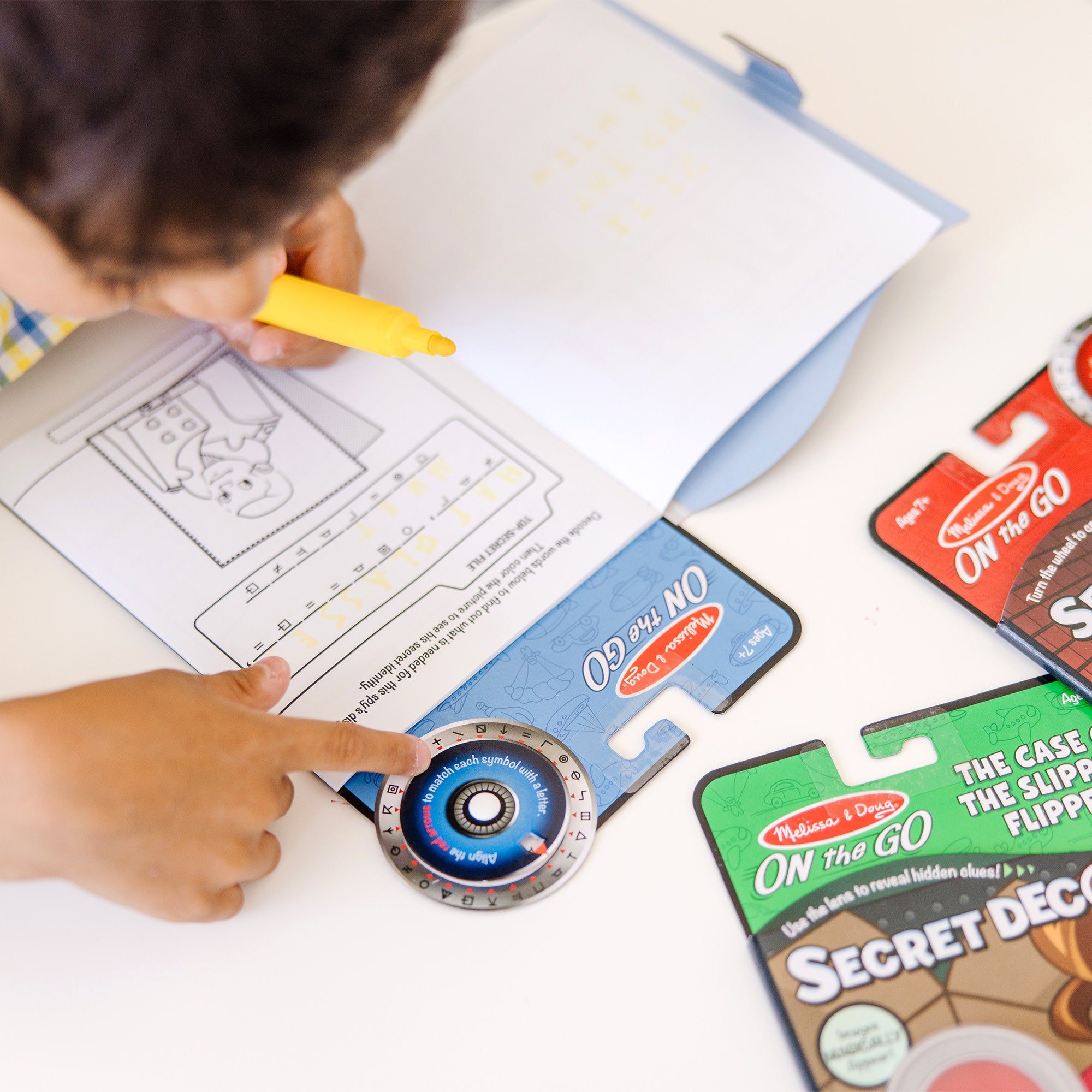 On the Go? Secret Decoder Activity Books 3-Pack: Slippery Flippers. Runaway Ruby. Game Book - Image 3
